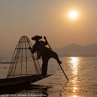 Buy canvas prints of Myanmar. Fisherman on Inle lake at sunset, Burma by Delphimages Art