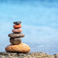 Buy canvas prints of Pile of beach pebbles, zen balanced stones by Delphimages Art