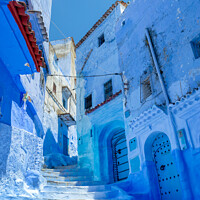 Buy canvas prints of Street in the blue city of Chefchaouen in Morocco by Delphimages Art