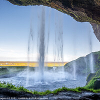 Buy canvas prints of Iceland. Walking behind Seljalandsfoss waterfall by Delphimages Art