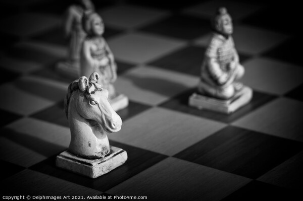 Chess. White knight on a chinese chess game  Picture Board by Delphimages Art