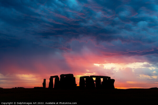 Stonehenge at sunset, dramatic sky Picture Board by Delphimages Art