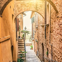 Buy canvas prints of Tuscany. street in the village of Montepulciano by Delphimages Art