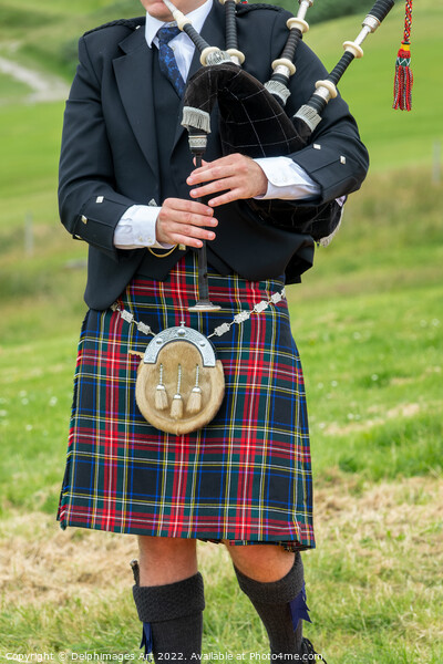 Scottish bagpiper in traditional kilt in the Highl Picture Board by Delphimages Art