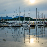 Buy canvas prints of Boats reflection in the harbor of Oban by Delphimages Art