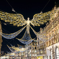 Buy canvas prints of Angels Christmas lights in Regent street, London by Delphimages Art