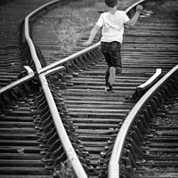Buy canvas prints of Boy running on old railway tracks in Bristol by Delphimages Art