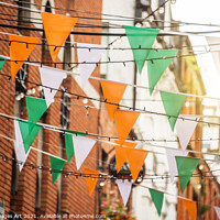 Buy canvas prints of Irish flags garlands, Saint Patrick day in Dublin by Delphimages Art