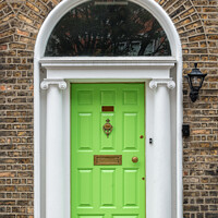 Buy canvas prints of Green georgian door in Dublin, Ireland by Delphimages Art
