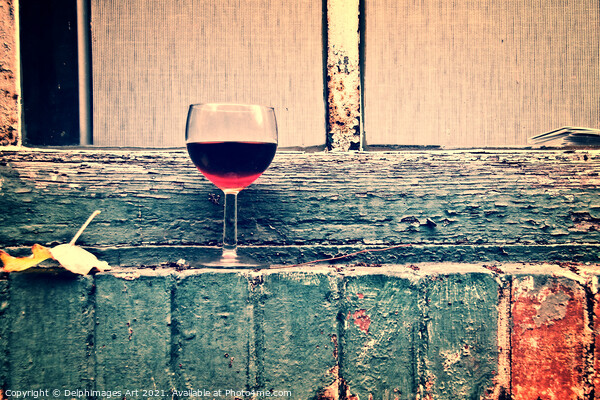 Glass of french red wine on a window in Paris Picture Board by Delphimages Art