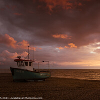 Buy canvas prints of Beached. Fishing boat on shingle beach by Martin Tosh