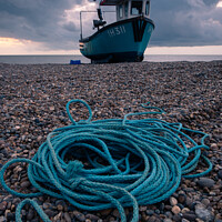 Buy canvas prints of Ropey. Fishing boat and rope on shingle beach by Martin Tosh