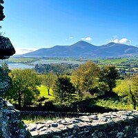 Buy canvas prints of Mourne Mountains Newcastle from the castle by Chris Mc Manus
