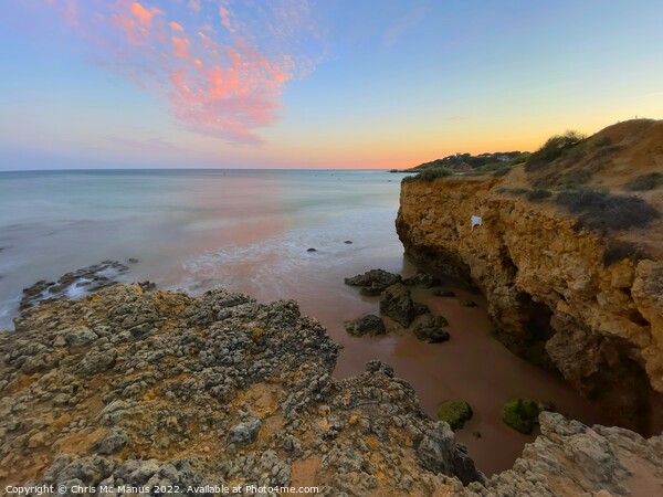 A Fiery Sunset on Majestic Algarve Cliffs Picture Board by Chris Mc Manus