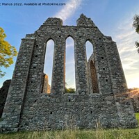 Buy canvas prints of Majestic Ruins of Inch Abbey by Chris Mc Manus