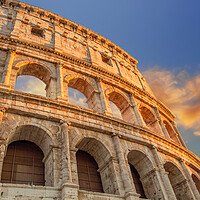 Buy canvas prints of Famous Coliseum (Colosseum) of Rome at early sunset by Elijah Lovkoff