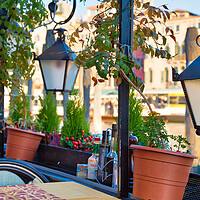Buy canvas prints of Restaurant terrace near a landmark in Venice by Elijah Lovkoff