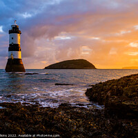 Buy canvas prints of Sunrise at Penmon Lighthouse by Nigel Wilkins