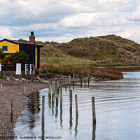 Buy canvas prints of YELLOW FISHERMENS CABIN by Michael Birch