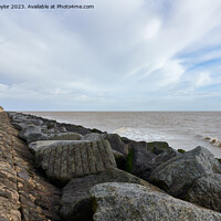 Buy canvas prints of The sea wall by Geoff Taylor