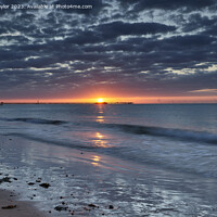 Buy canvas prints of Sunrise with moody clouds by Geoff Taylor