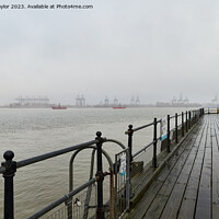 Buy canvas prints of Along the pier by Geoff Taylor