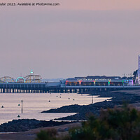 Buy canvas prints of Clacton pier early evening by Geoff Taylor