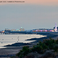Buy canvas prints of Clacton pier of an evening by Geoff Taylor
