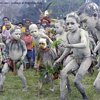 Buy canvas prints of Children dancing as Asaro mudmen, Papua New Guinea by Ian Murray