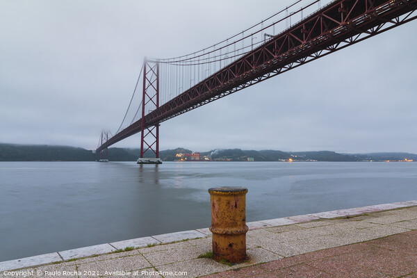The 25th of April (25 de Abril) suspension bridge over Tagus river in Lisbon Picture Board by Paulo Rocha