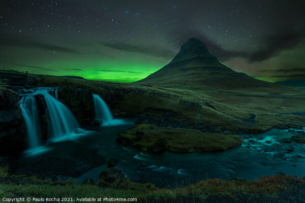 Northern lights over Mount Kirkjufell Picture Board by Paulo Rocha