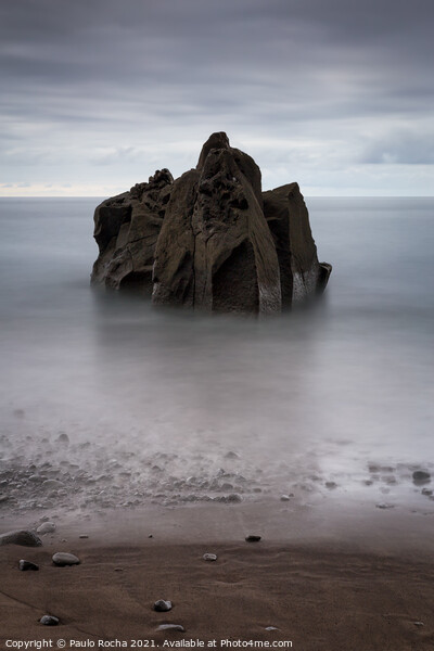 Long exposure seascape with a rock formation on the beach  Picture Board by Paulo Rocha