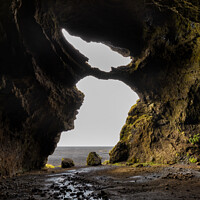 Buy canvas prints of Gígjagjá also known as Yoda cave in Hjoerleifshoefdi, south Iceland  by Paulo Rocha