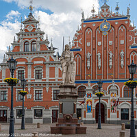 Buy canvas prints of House of the Black Heads and Roland Statue in Riga by Maria Vonotna