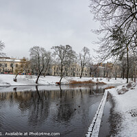 Buy canvas prints of Winter covered in snow park with canal in Riga by Maria Vonotna