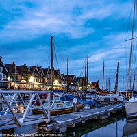 Buy canvas prints of Traditional fishing town night scene by Maria Vonotna