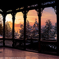 Buy canvas prints of Wooden openwork gallery with sunset view by Maria Vonotna