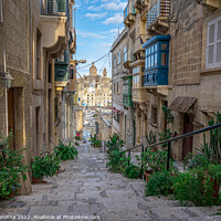 Buy canvas prints of Narrow street in Valletta by Maria Vonotna