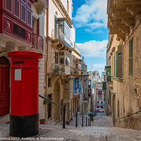 Buy canvas prints of Red vintage mail box in Malta by Maria Vonotna