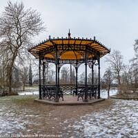 Buy canvas prints of Metal openwork gazebo in public park in winter by Maria Vonotna