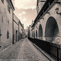 Buy canvas prints of Narrow medieval street in the historic city center by Maria Vonotna