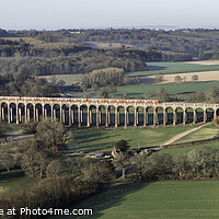 Buy canvas prints of Red train at Ouse valley Viaduct by Paul Hutchings