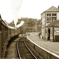 Buy canvas prints of Corfe Castle steam train station sepia by Sandra Day