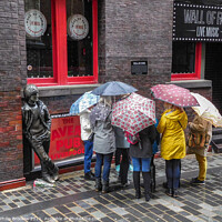 Buy canvas prints of Umbrella Group at the Cavern Club by Philip Brookes