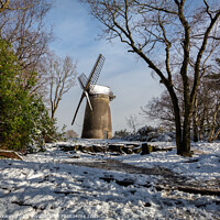 Buy canvas prints of Bidston Windmill in the Snow by Philip Brookes