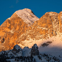 Buy canvas prints of Tofana di Rozes Peak in Cortina d'Ampezzo in Winter at Dawn by Dietmar Rauscher