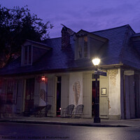 Buy canvas prints of Lafitte's Blacksmith Shop in New Orleans, Louisiana in the evening by Dietmar Rauscher