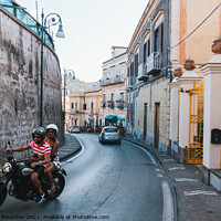 Buy canvas prints of Via Roma Street in Massa Lubrense with Motorcycle by Dietmar Rauscher