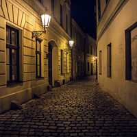 Buy canvas prints of Retezova Street in Prague at Night, a Mysterious, Dark Cobblesto by Dietmar Rauscher