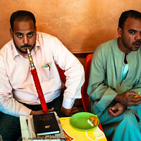 Buy canvas prints of Egyptian Man Smoking Shisha by Dietmar Rauscher